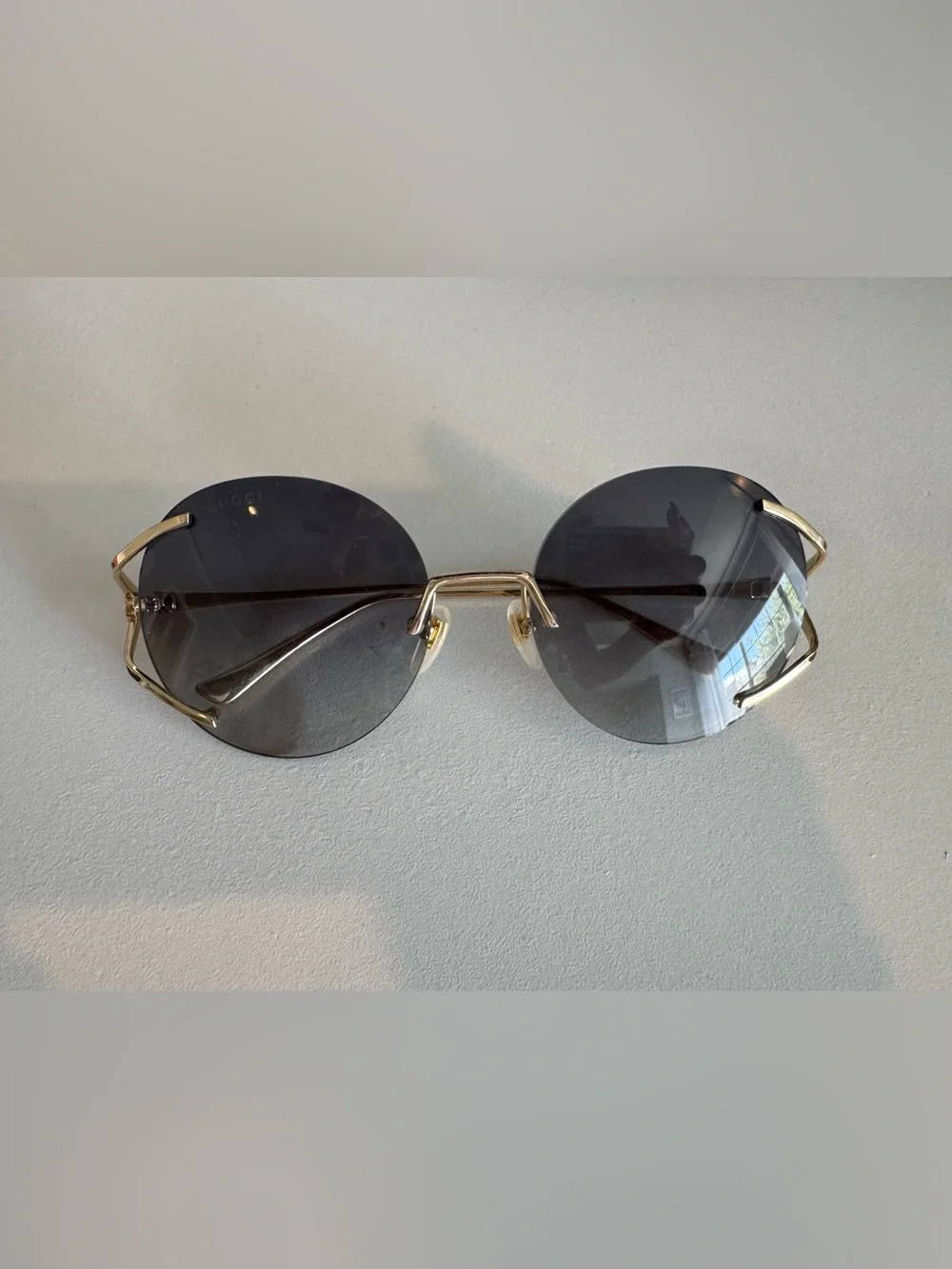 Gucci GG0645S round sunglasses